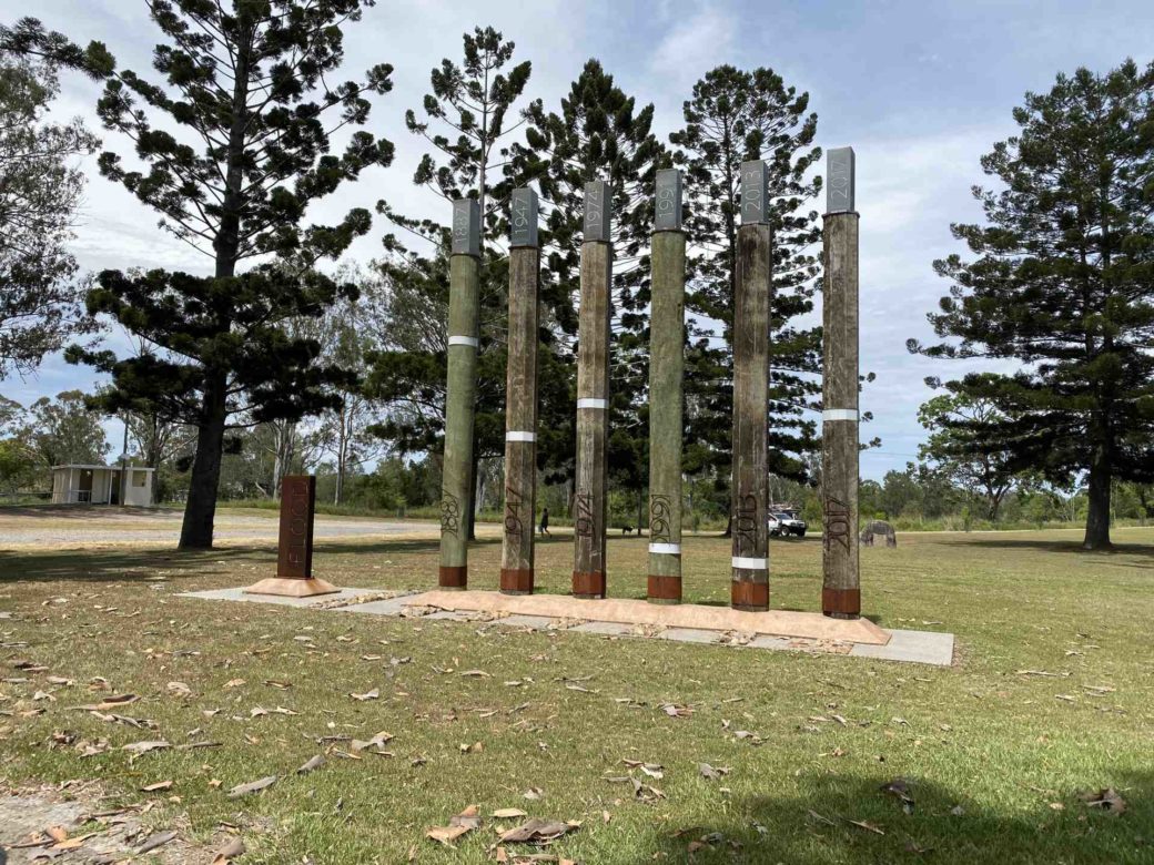 Historic flood level markers on gumboot display at Tully Memorial Park, Far North Queensland