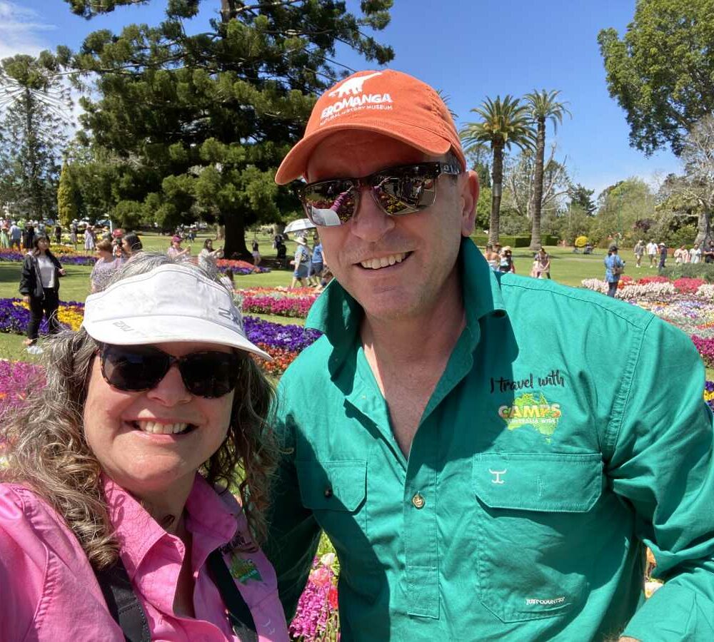 Couple in CAMPS Australia shirts enjoying Toowoomba Carnival of Flowers Queensland