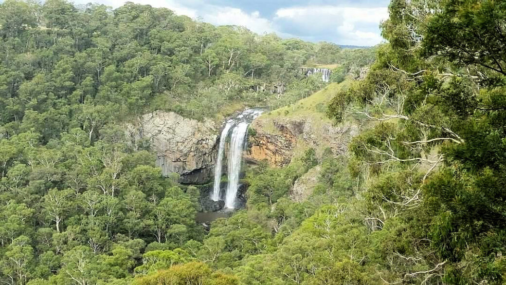 Ebor Falls two-tiered waterfall viewed from lookout platform