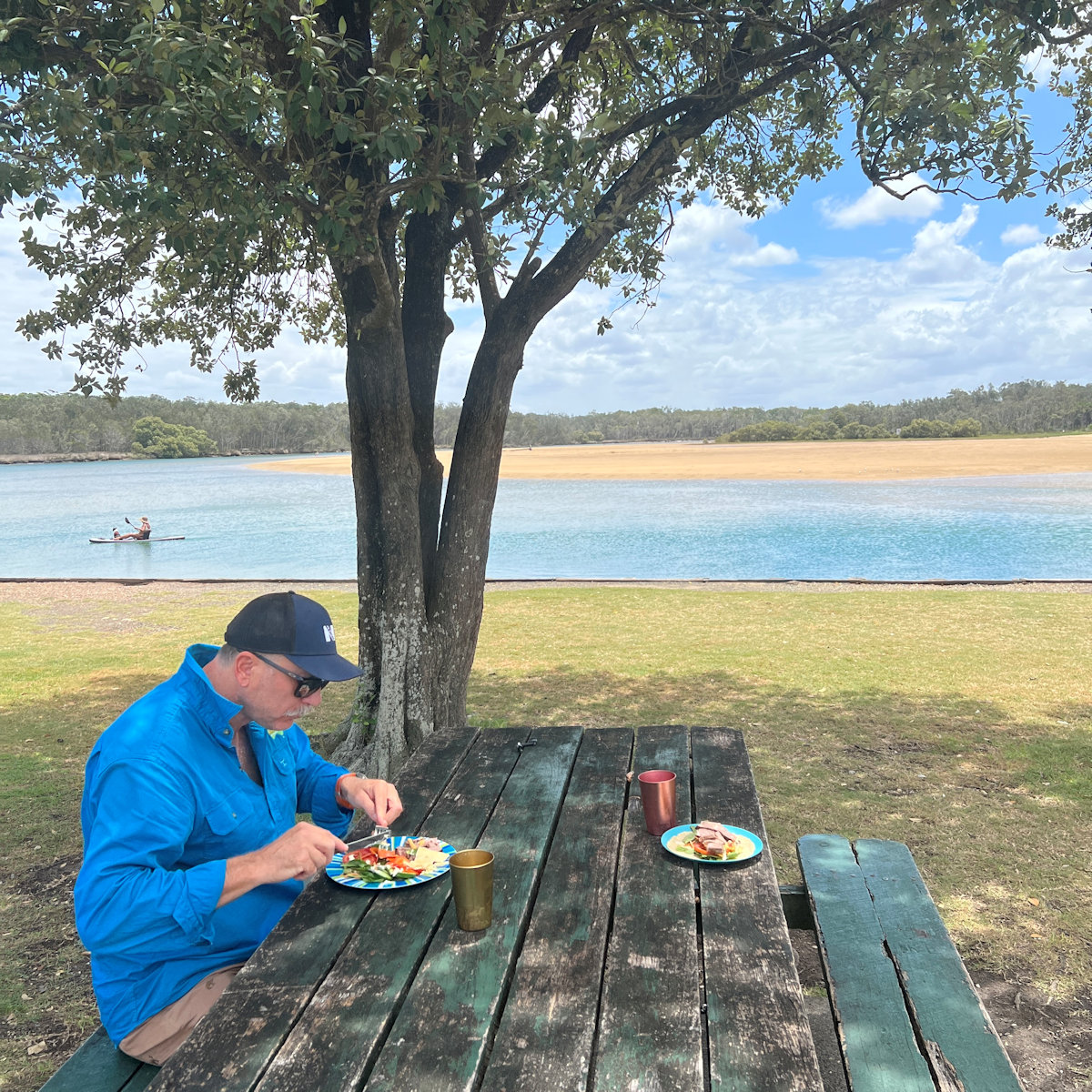 Picnic area with tables and ocean views at Tom Richards Memorial Park, Red Rock NSW