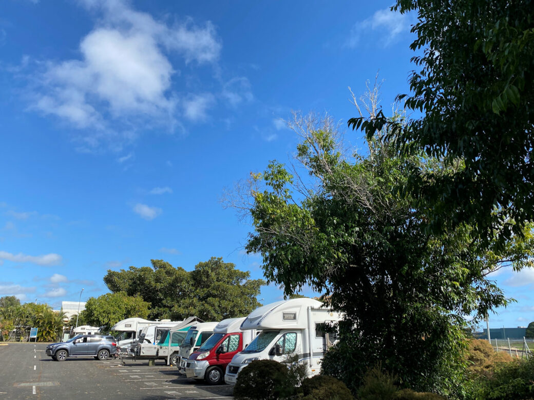 Campervans at Alan & June Brown free camp car park with river views in Maryborough QLD