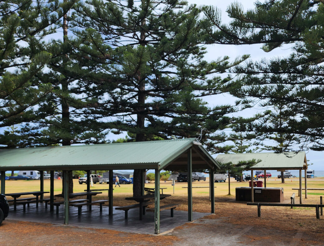 Covered picnic shelters at Rapid Bay beachside campground facilities