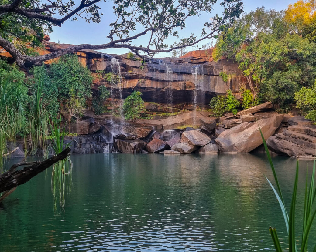 Little Mertens Falls cascading into emerald pool near Mitchell Falls, Kimberley