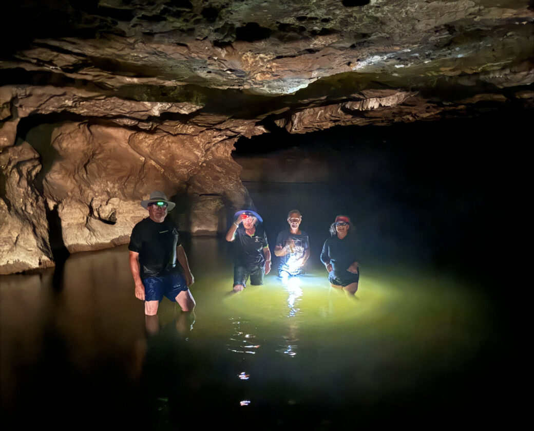 Explorer wading through Tunnel Creek's underground cave system near Windjana Gorge
