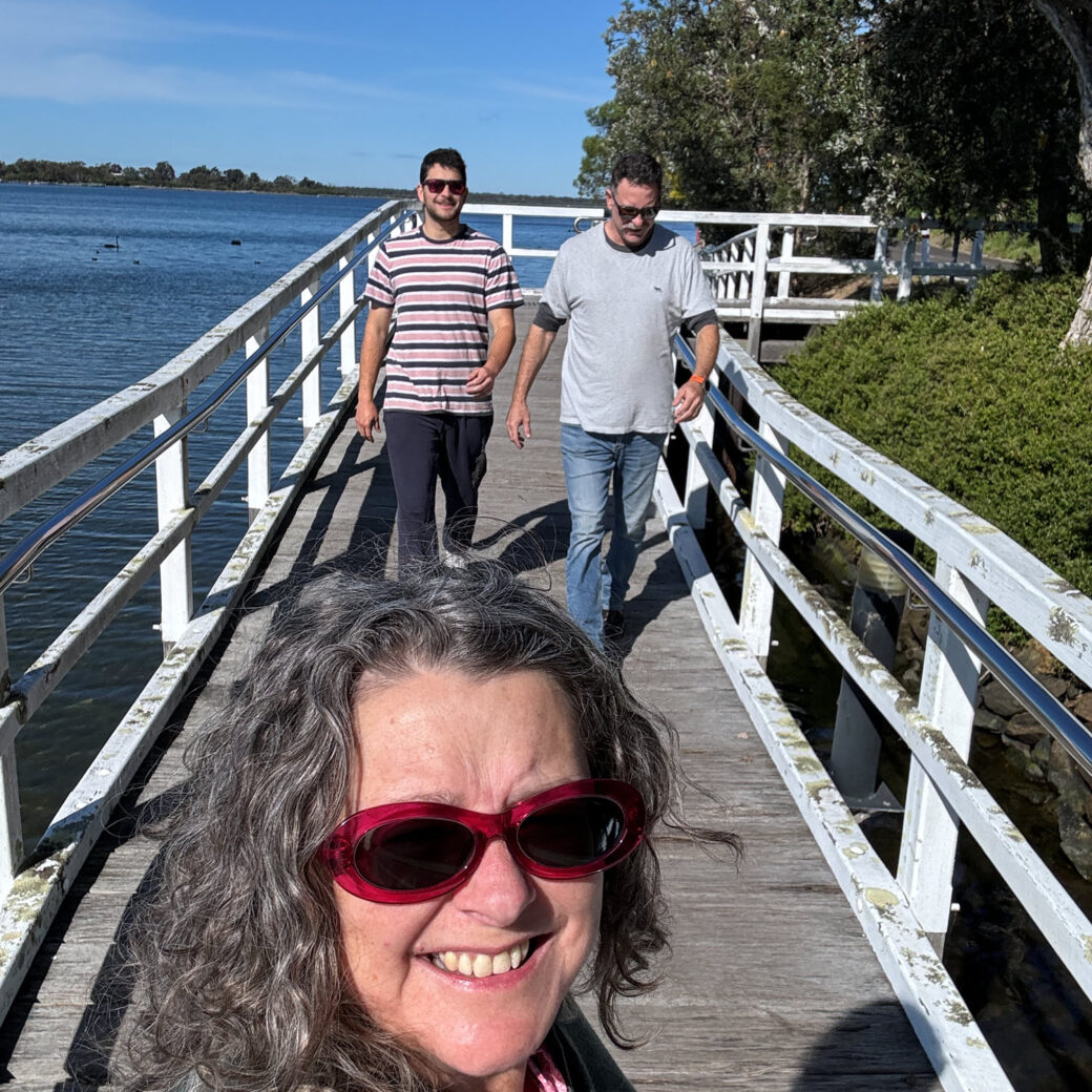 Wooden boardwalk path through natural wetlands in Metung, Victoria