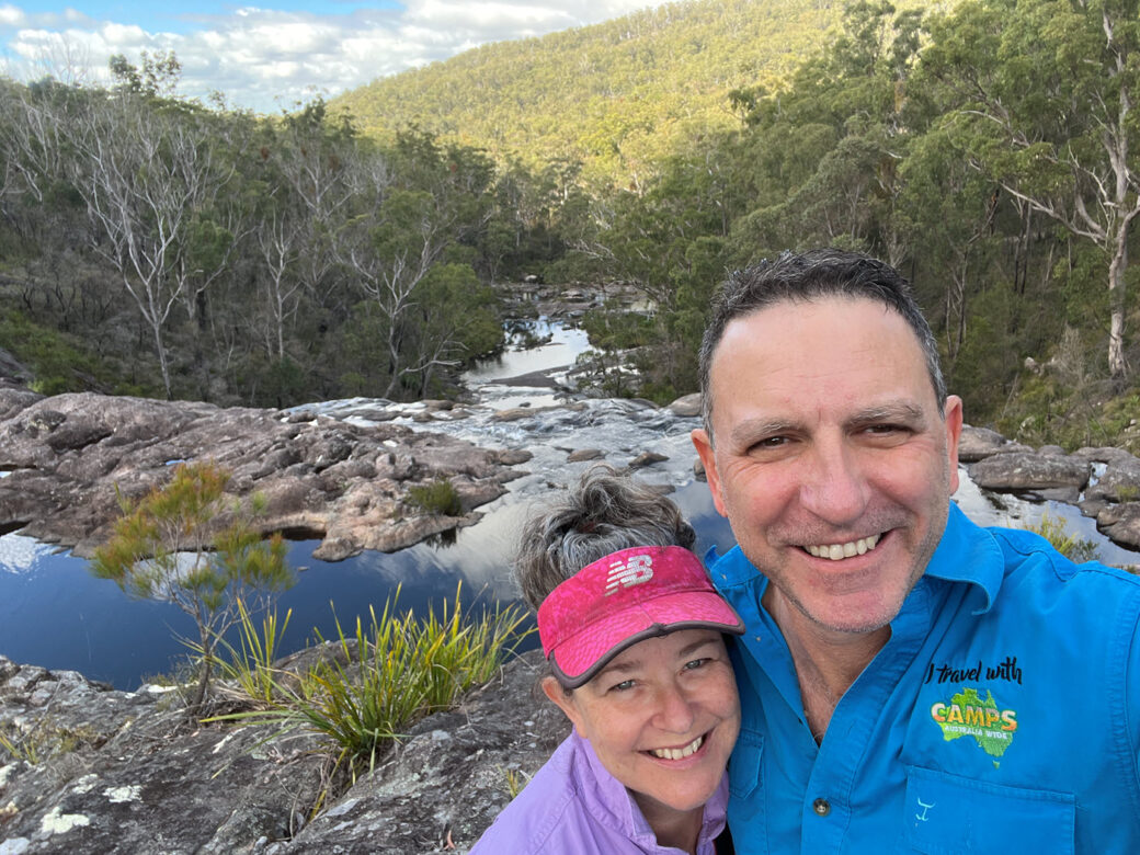 Upper Falls cascading over rocks at Basket Swamp Campground in New South Wales