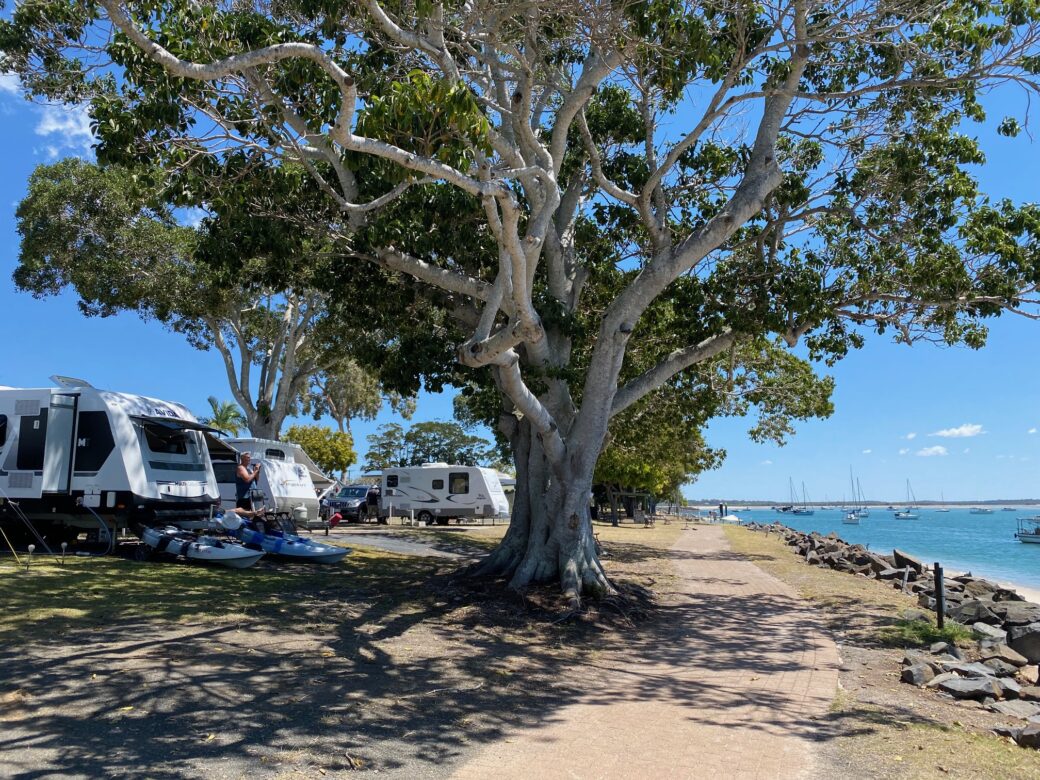 Caravan and camping area at Burrum Heads Beachfront Park near the Queensland coast