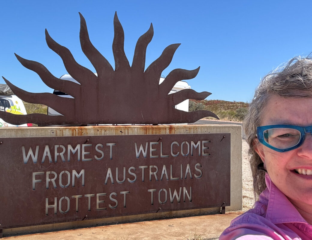 Welcome sign reading 'Warmest Welcome from Australia's hottest town' in Marble Bar