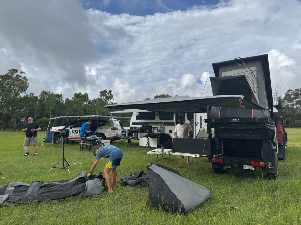 Steve's camping setup with rooftop tent mounted on 4WD and swag laid out beside vehicle