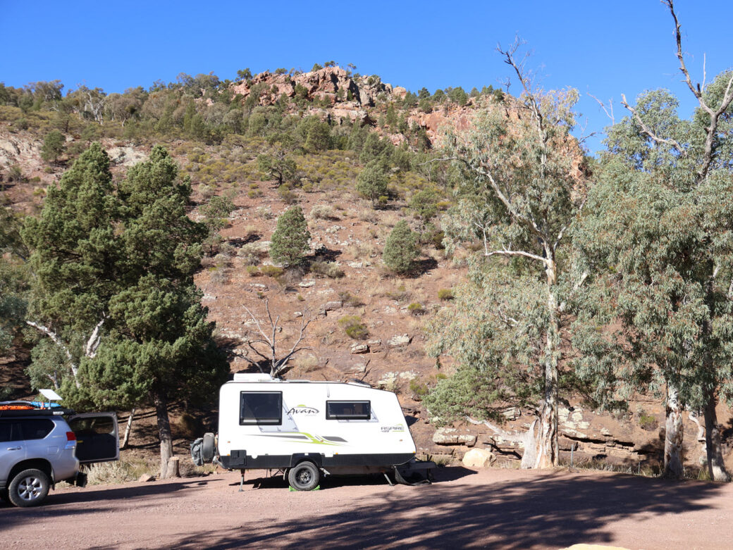 Warren Gorge camping area surrounded by rocky cliffs in the Flinders Ranges, South Australia