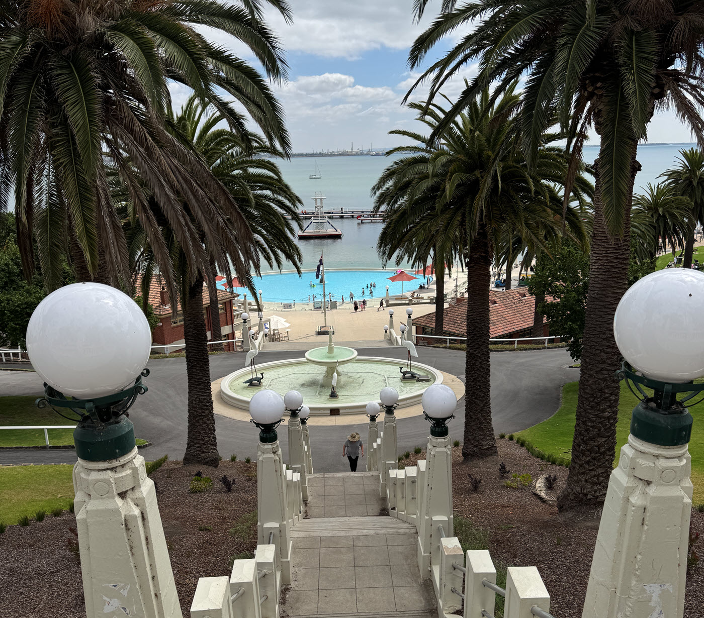 Art deco bathing pavilion at Eastern Beach sea bath in Geelong with calm turquoise waters